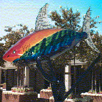 The Shark statue called SunOnYourSkin_AcheInYourBones